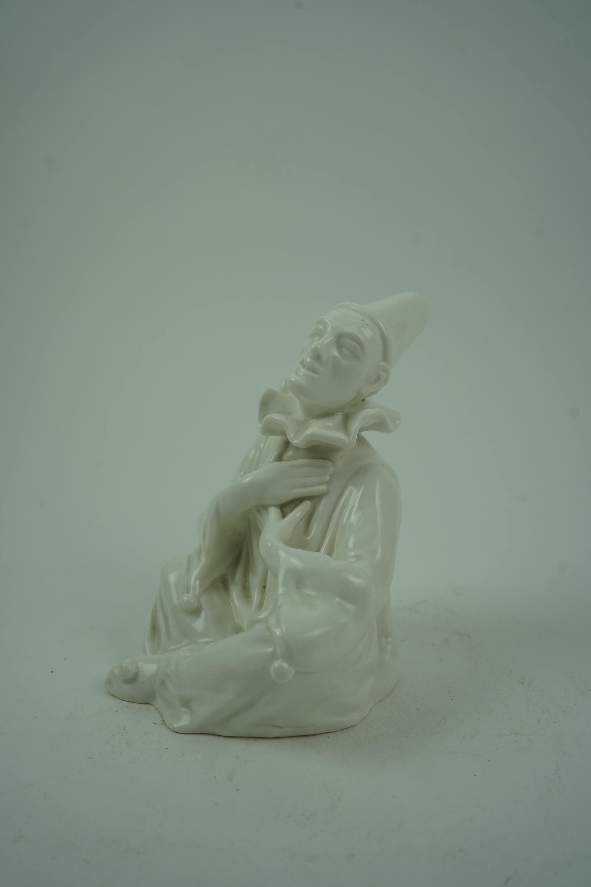 Charles J. Noke (1858-1941) for Royal Doulton: 'Sentimental Pierrot'